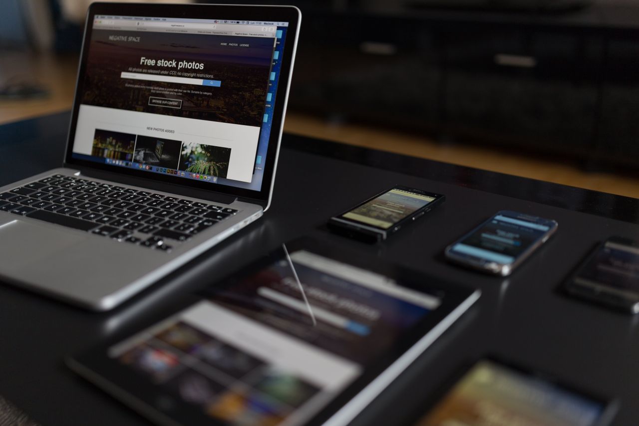 home-hero A contemporary workspace showcasing a laptop, tablet, and smartphones, ideal for tech and freelance use.